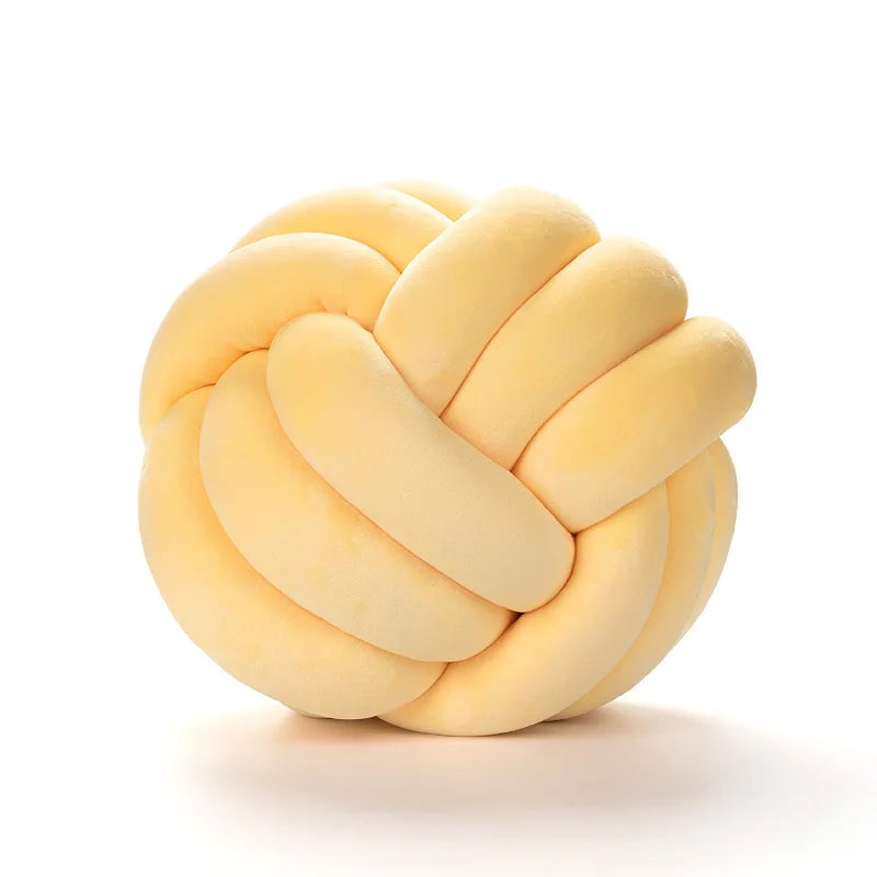 Axée sur le design et la décoration 
Coussin Nœud Scandinave – Décoration Moderne & Cosy